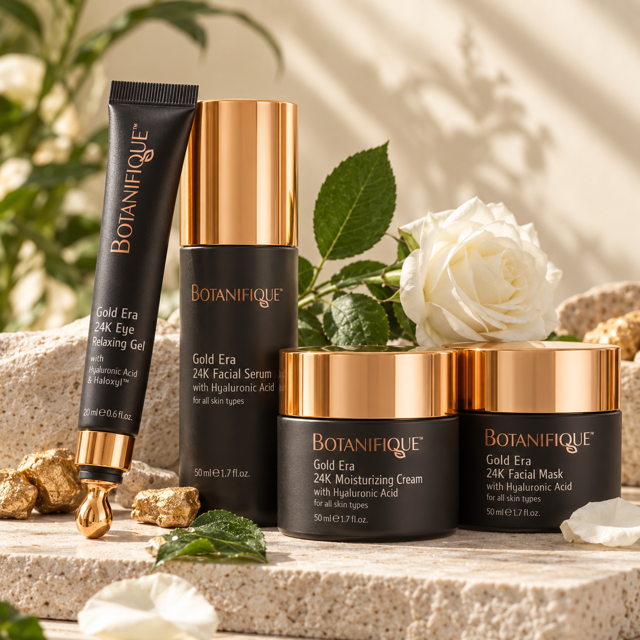 Botanifique's Gold Era line - a cream, serum, and mask in black and gold packaging.