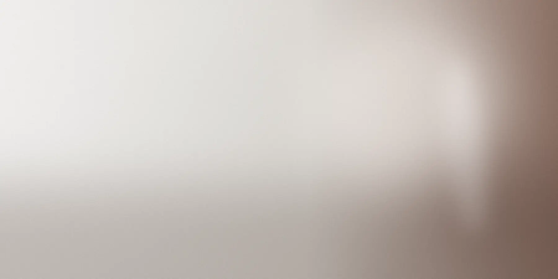 Abstract editorial hero in graphite with a warm pigment accent, LOREN STANDARD brand profile backdrop